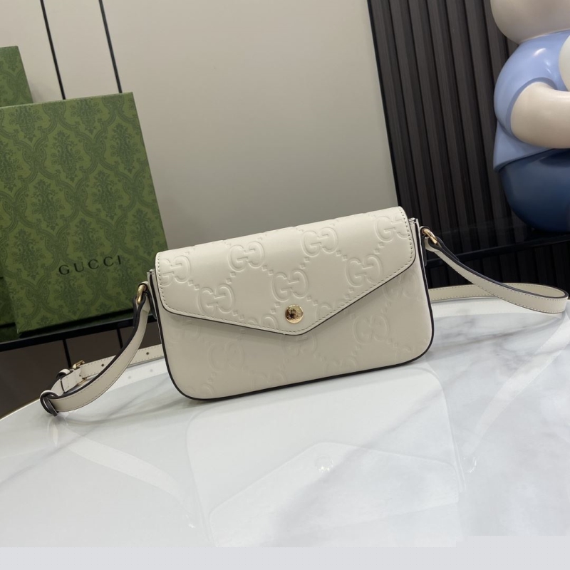 G*u*i satchel bags